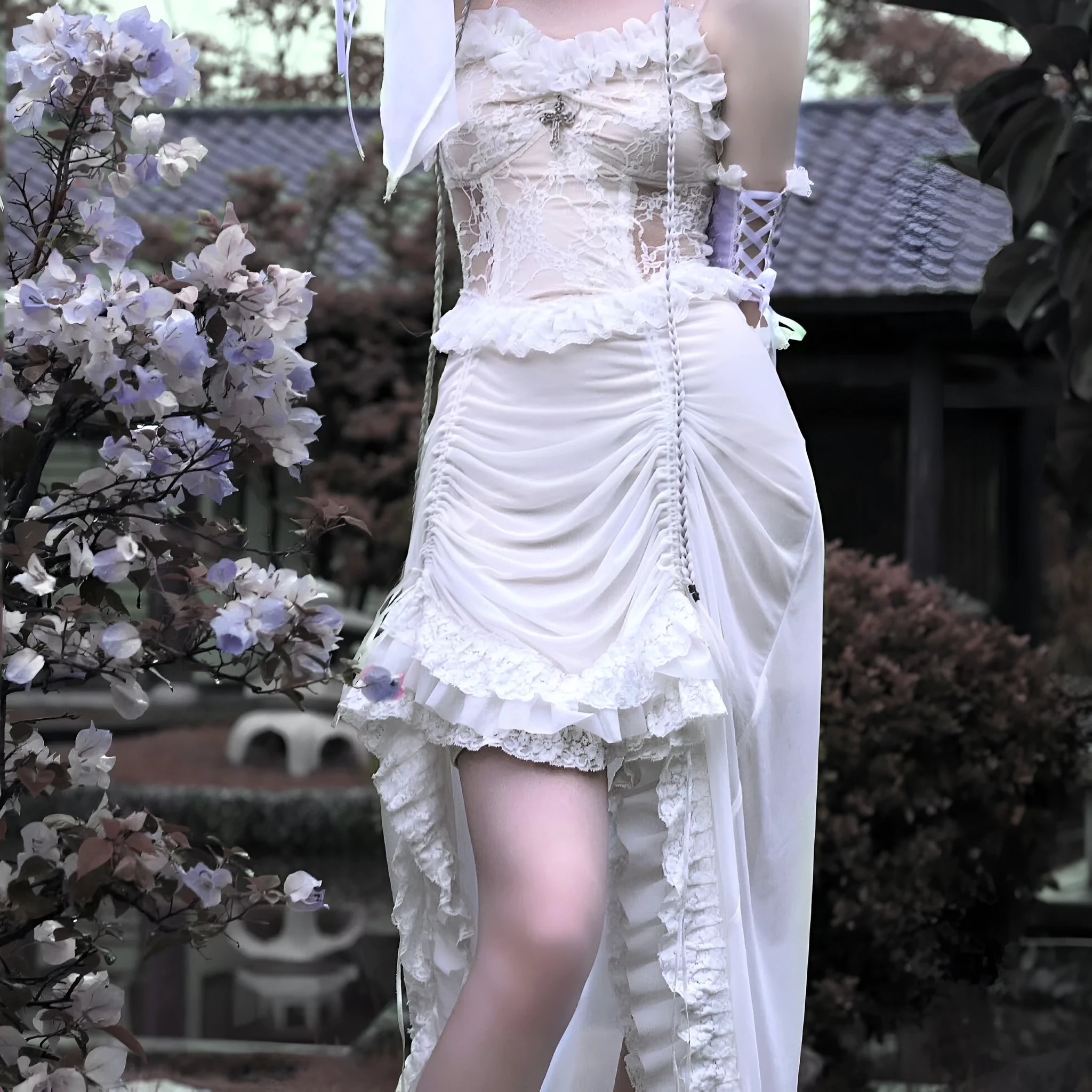Chinese style white gothic drawstring mesh dress with dark straps and detached oversleeves on display