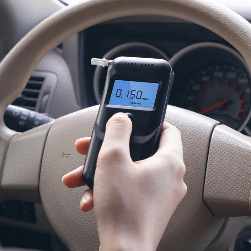 Black portable alcohol breath tester for personal drunk driving prevention checks