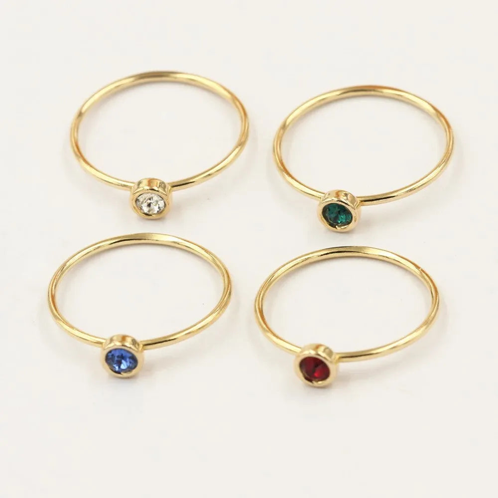 14K gilded GF zircon knuckle rings in green, blue, dark red, and white colours