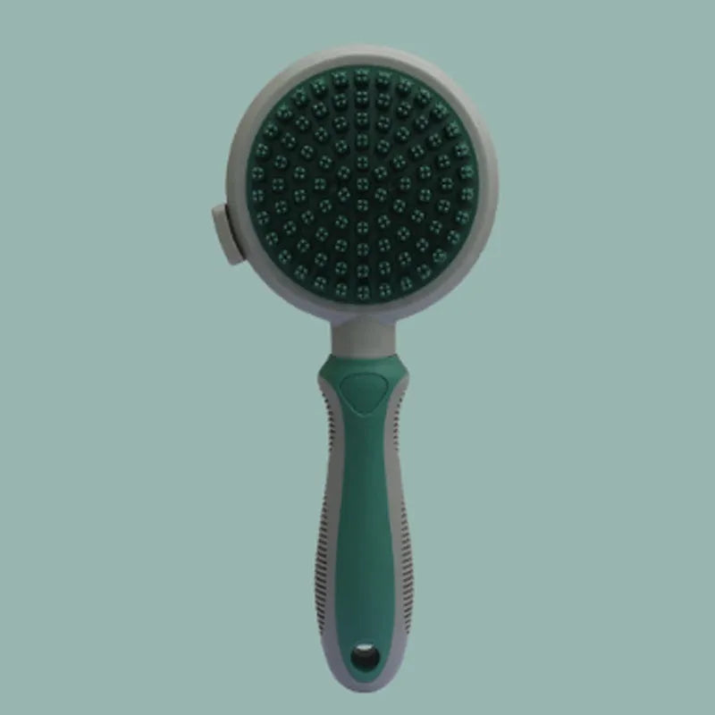 Green and pink dual-sided pet brush with slicker pins on one side and silicone massage pins on the other
