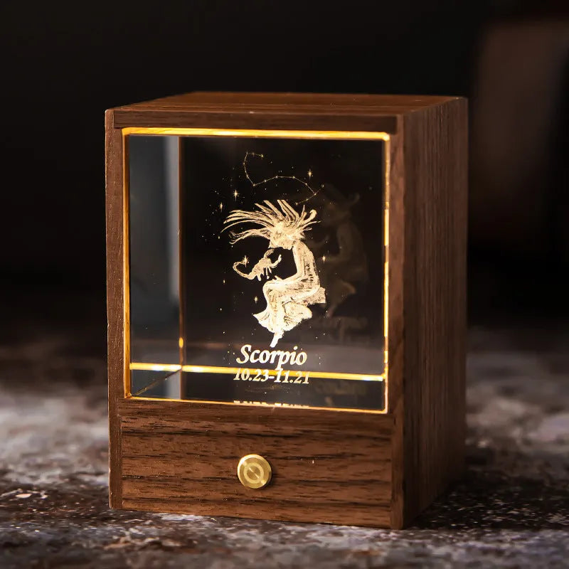 Crystal LED table lamp with black walnut base and K9 crystal showing constellation night light effect