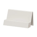 Geometric PS plastic business card stand with 20 slots in brown on a desk