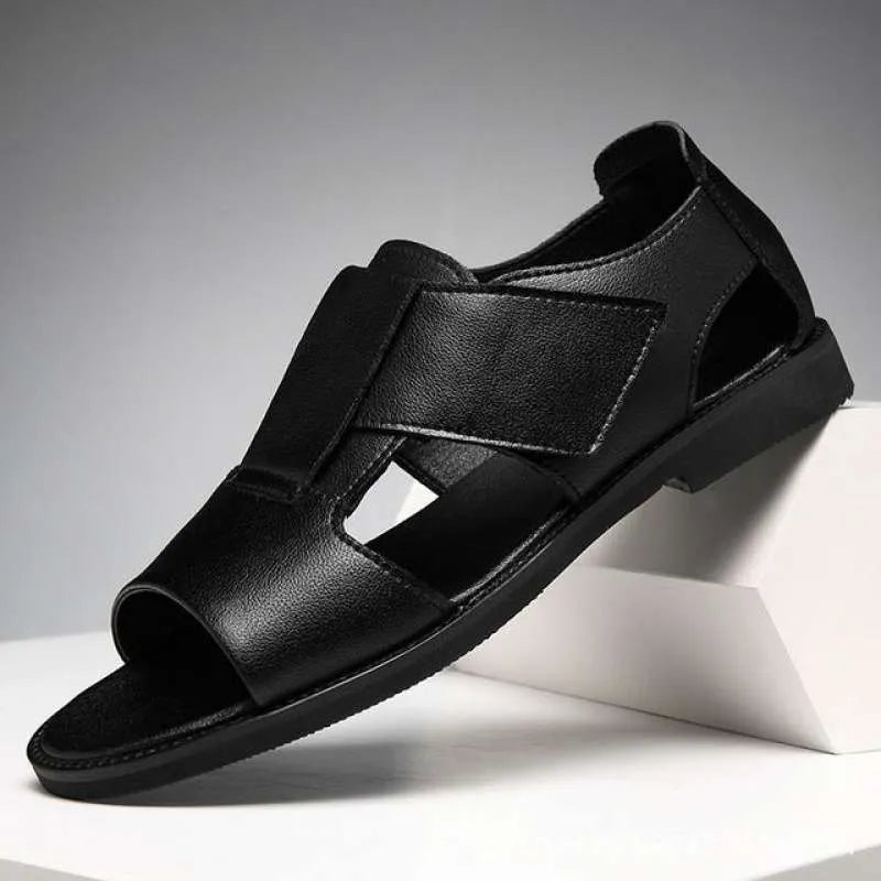 Men's black and brown leather Roman-style casual sandals with an open toe and rubber sole.
