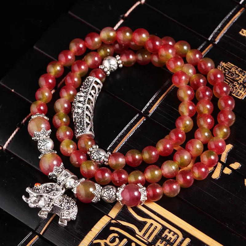 Handmade natural watermelon crystal bracelet with Chinese knotting in elephant style geometric design