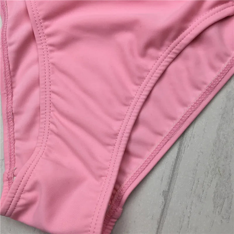 Cut out bikini set in pink or black with halter neck and cross detail, sizes S M L