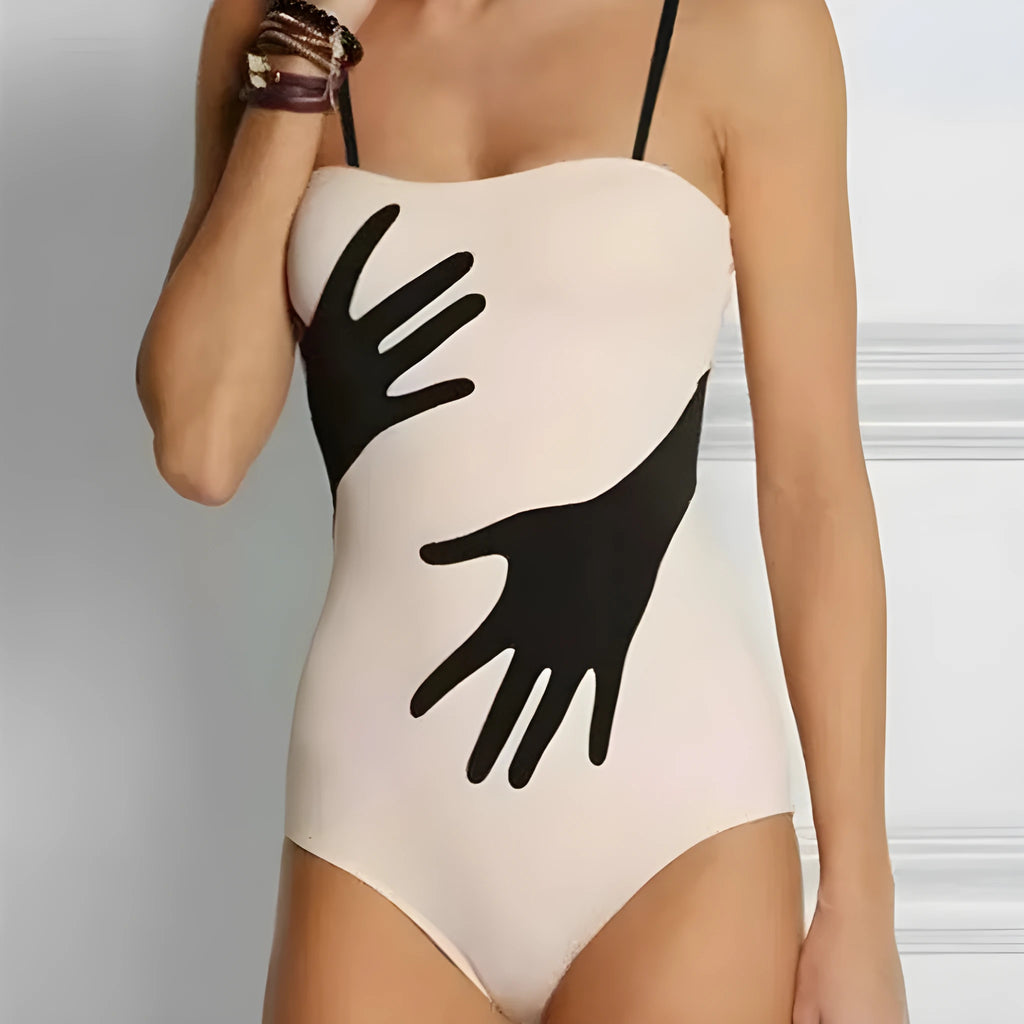 Women's one-piece bikini swimsuit with a gauze skirt attached, shown in available colours.
