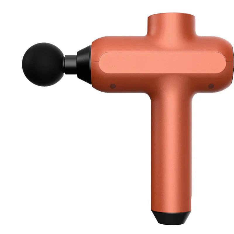 Handheld black muscle massager with six different coloured massage heads on a table.