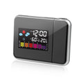 Black digital projection alarm clock showing time display with temperature and humidity readings