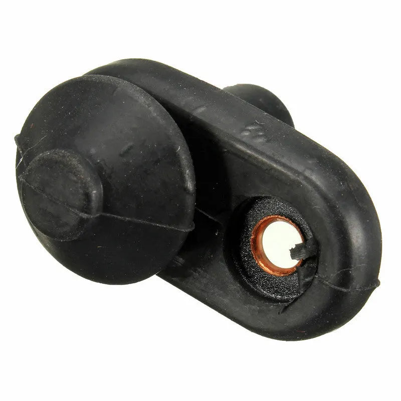 Black universal car interior door light press switch on white background.