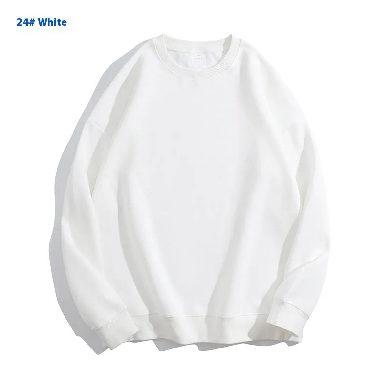Cotton loose fit off shoulder pullover sweater in a selection of colours on a hanger
