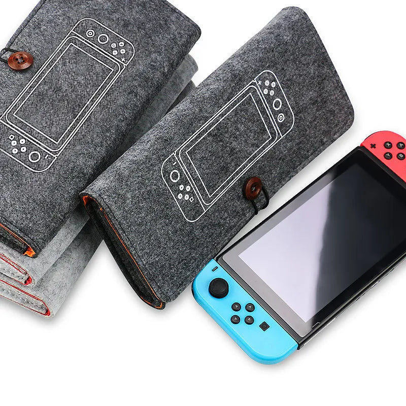 Black felt pouch for Nintendo Switch console with game card slots and accessory compartments