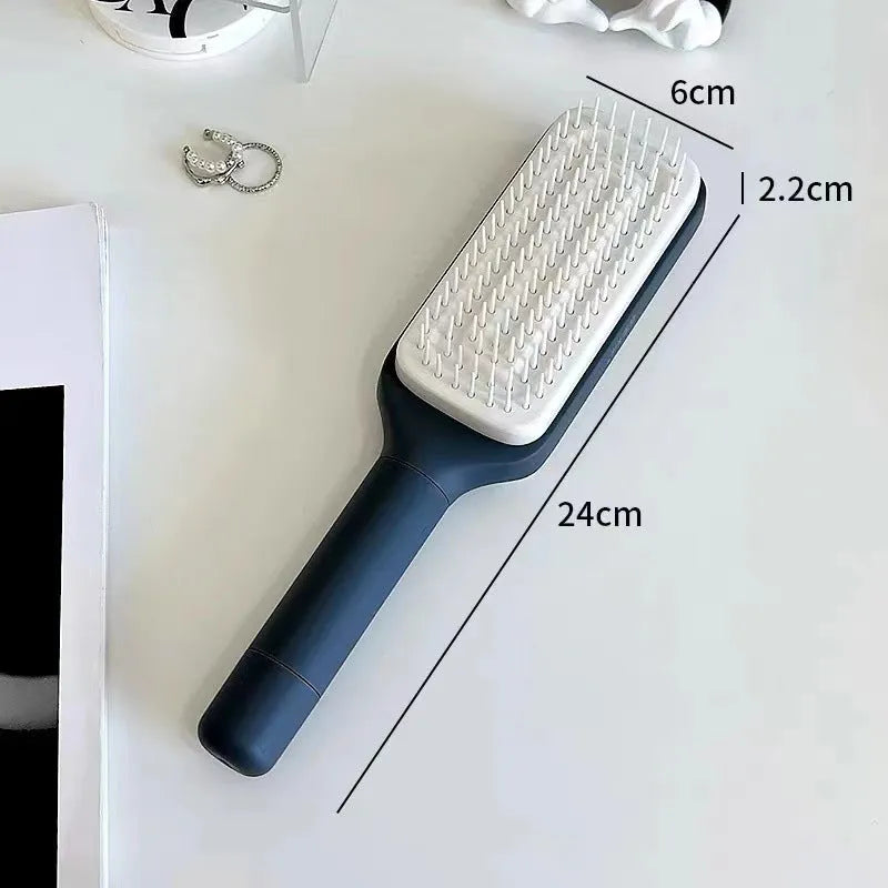 Roland purple self-cleaning hair brush with rotating handle and anti-static teeth
