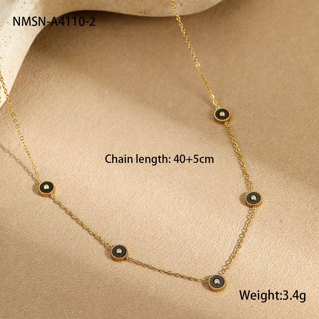 Geometric fritillary design bracelet and necklace set with 18K gold plating on stainless steel.