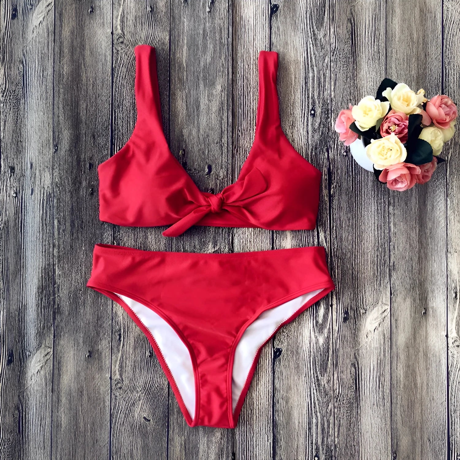 Women's solid colour bikini set with sleeveless top and matching briefs in polyester fabric