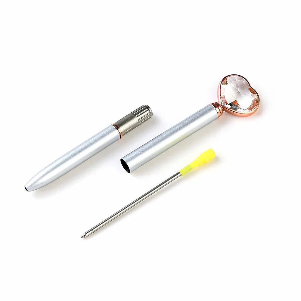 Creative Crystal Love Ball diamond metal pen in rose gold on a white background