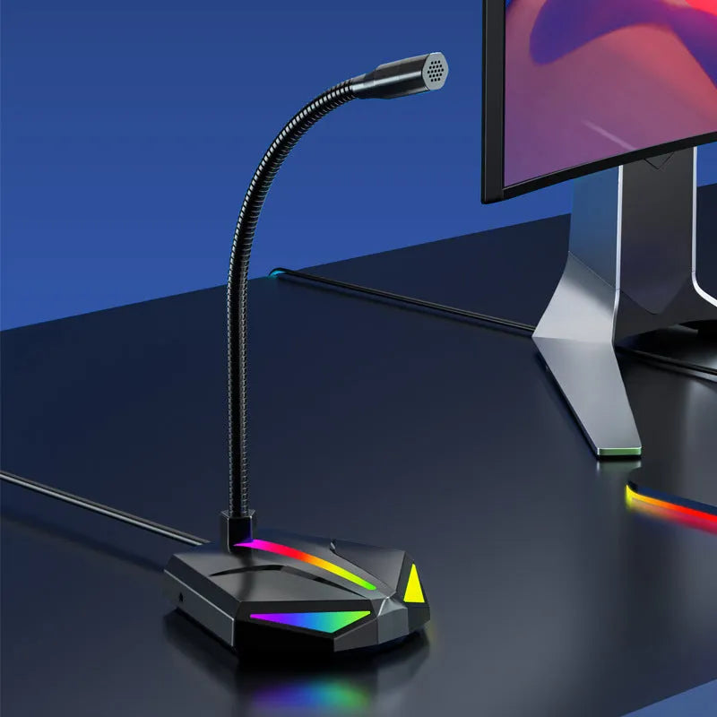 USB gaming microphone with moving coil and stand on a desk for computer voice chat