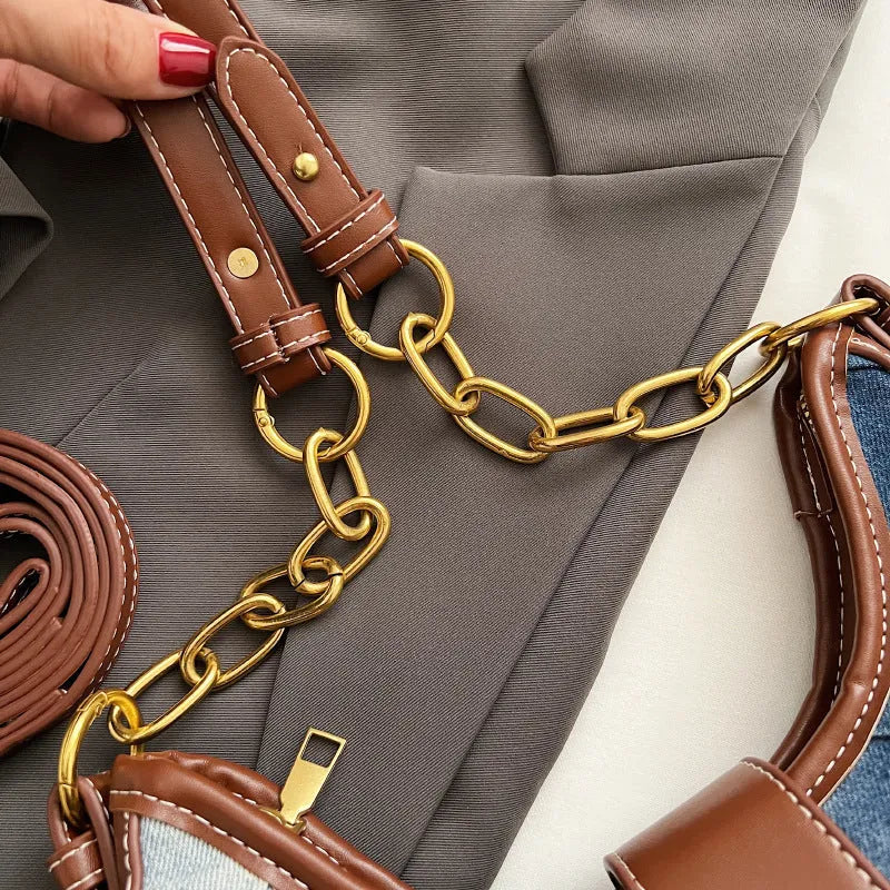 Brown denim women's bucket shoulder bag with diamond chain straps and lock detail