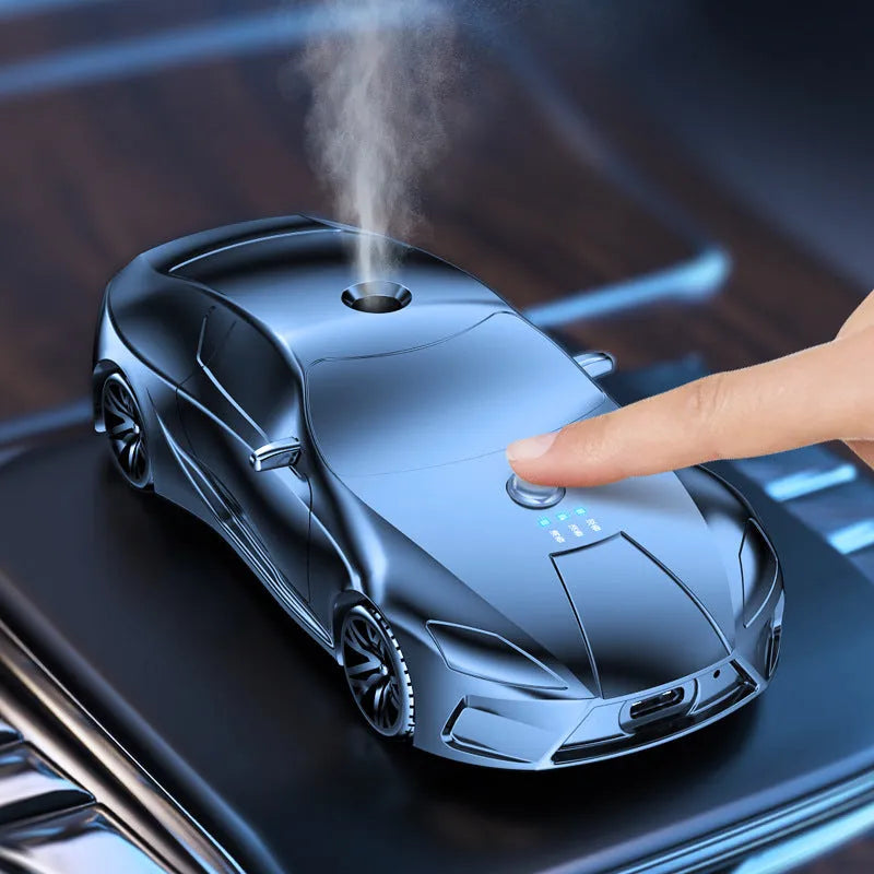 Grey car model aromatherapy diffuser in aluminium alloy, 12.9 cm x 5.9 cm x 3.7 cm, 30ml capacity, with three essential oils