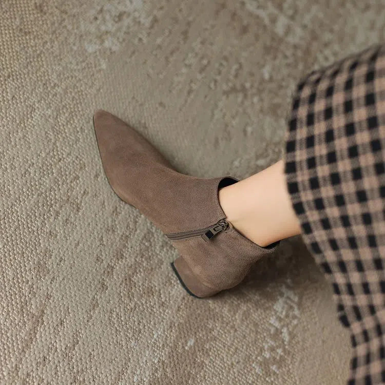 Women's matte suede chunky-heel ankle boots with pointed toe and side zipper in black with cotton lining