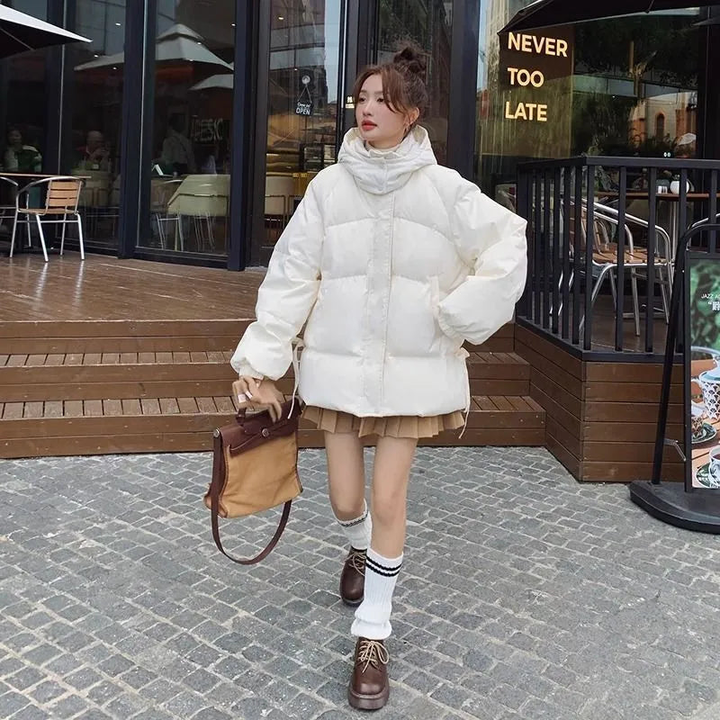 Women's loose insulated jacket with princess sleeves in milky white colour