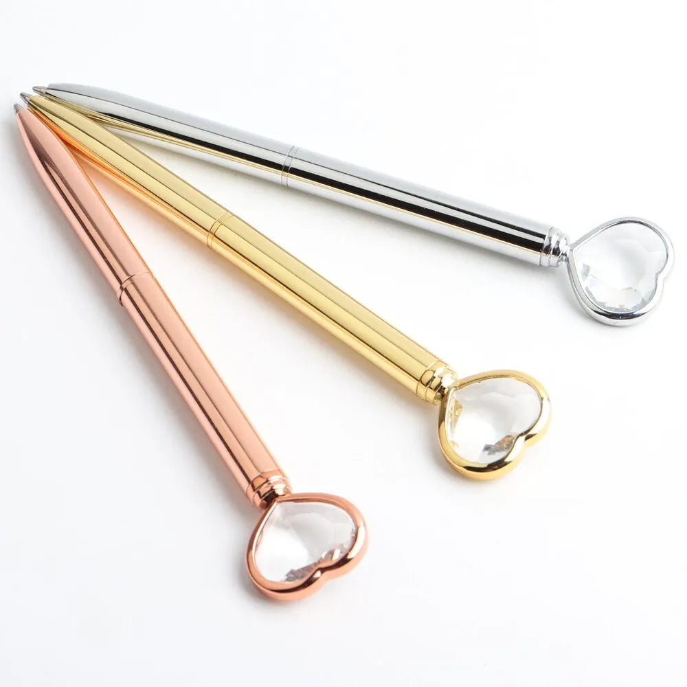 Creative Crystal Love Ball diamond metal pen in rose gold on a white background
