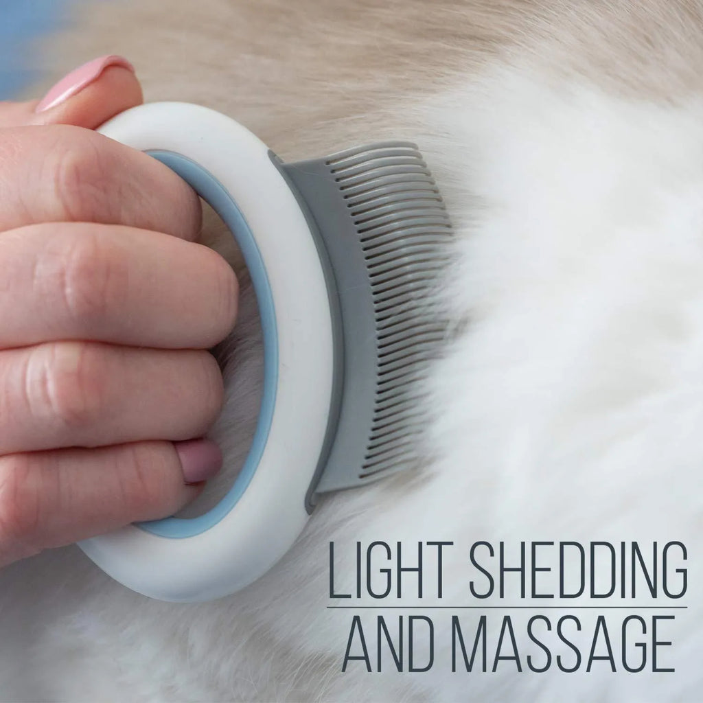 Blue plastic pet grooming comb with ergonomic handle for deshedding cats and dogs.