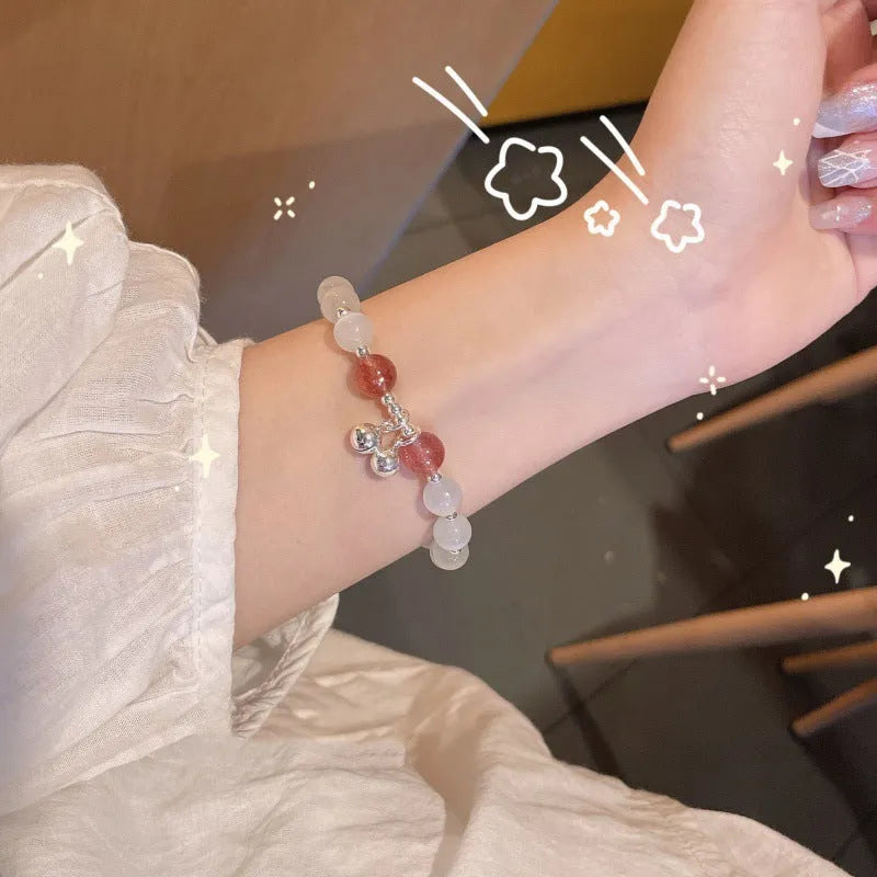 Chinese style glass bead bracelet with bamboo leaf design and manual craftsmanship details.