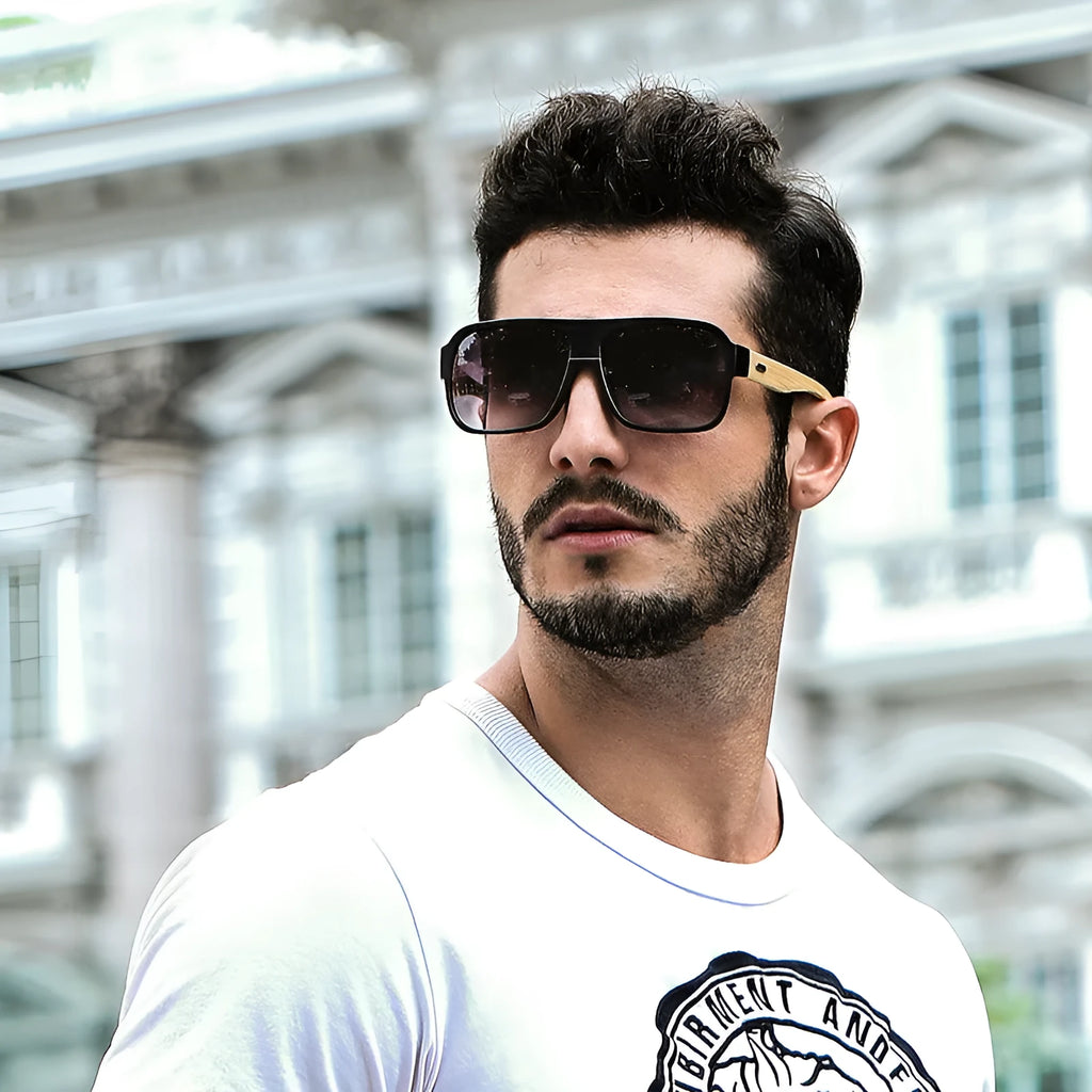 Wooden square sunglasses with brown frame and PC lenses on a flat surface