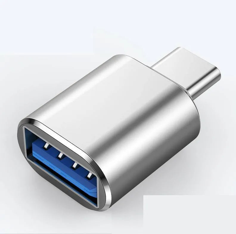 Type-C OTG adapter for smartphones in black, silver, and gold colour options