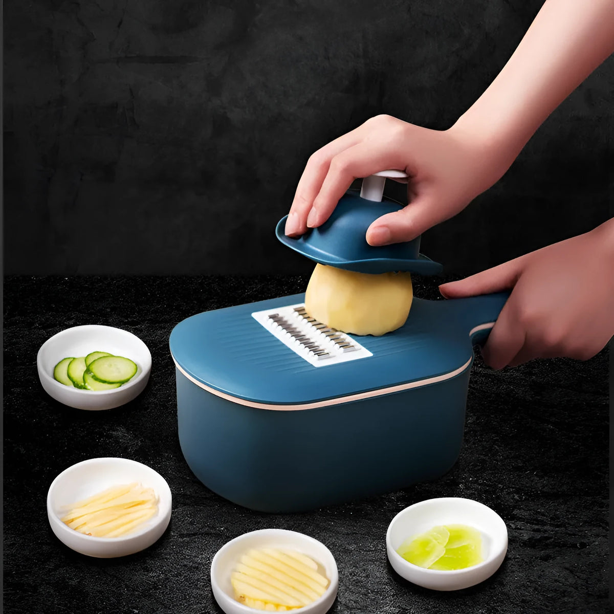 Vegetable cutter with four blades, hand protection, drain basket and bottom basin in dark blue, pink, white or light blue