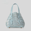 Hollow carved PU leather messenger bag with three straps in horizontal square shape