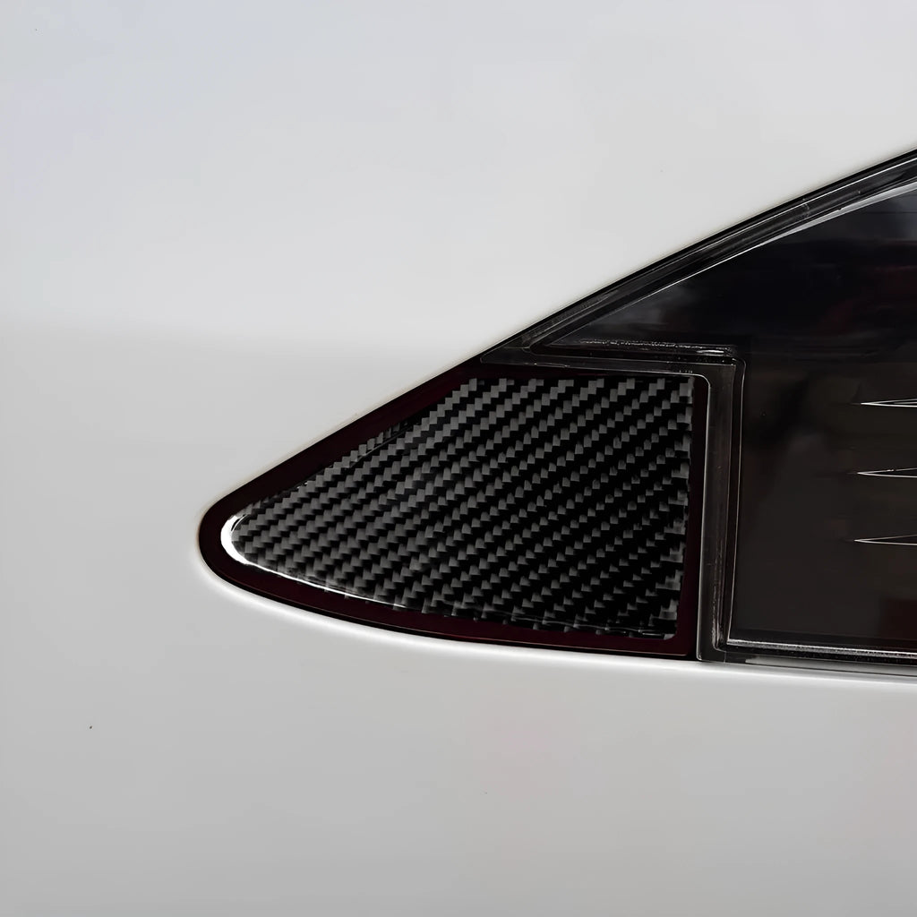 Black carbon fibre USB charging port panel decorative sticker with 3M adhesive backing.