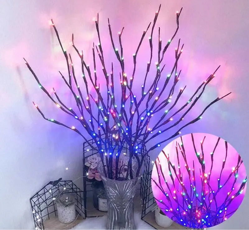 LED decorative tree light in a vase with colourful or warm white lighting options.