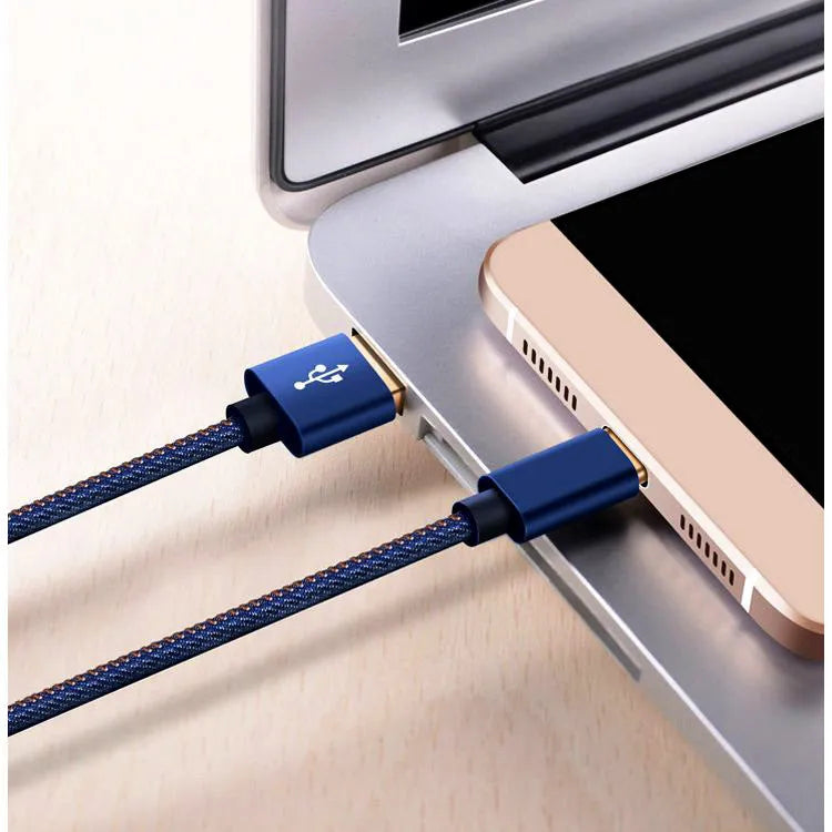 Cowboy-style denim USB-C charging cable with aluminium connectors in black, blue, or red.