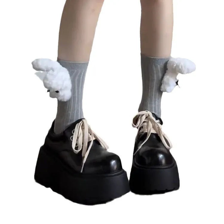Matte black women's lace-up shoes with a chunky rubber sole and 6-8cm heel.