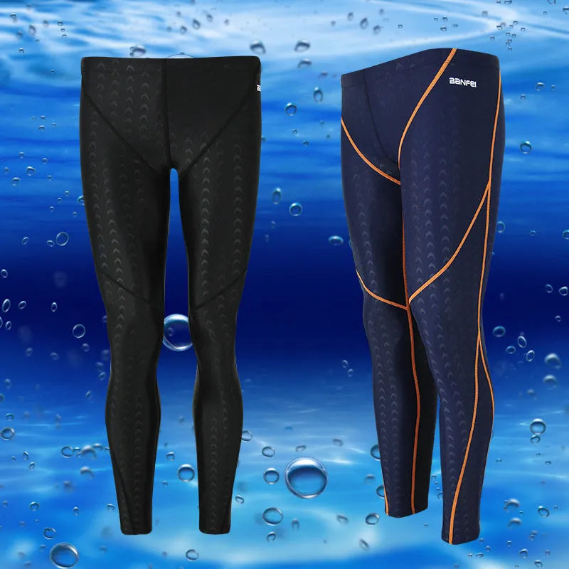 Men's black and green line nylon cropped swimming trunks on a white background.