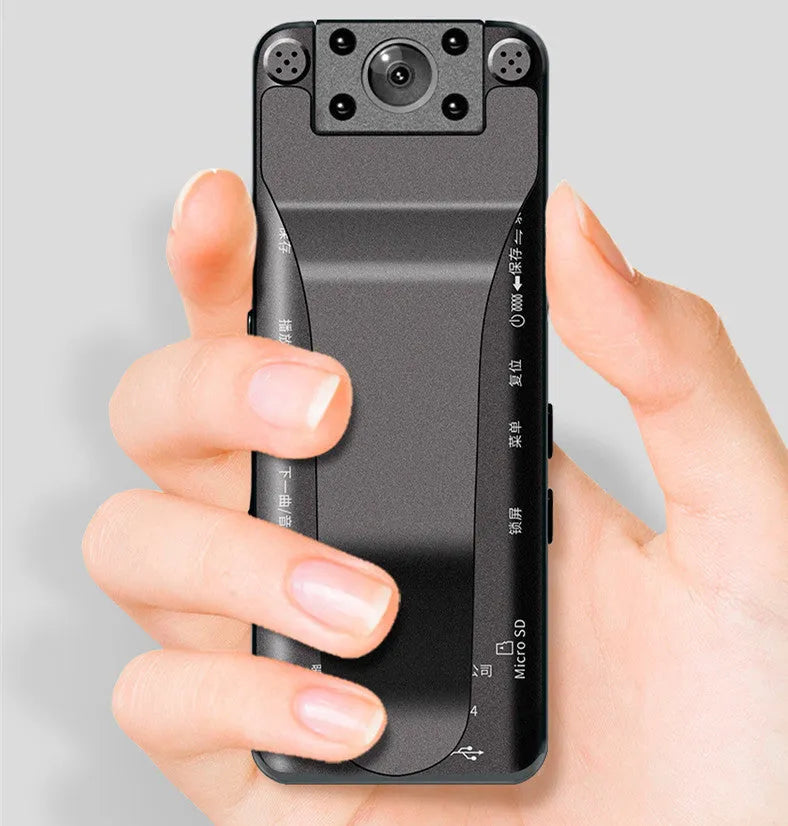 DSJ-S11 HD night vision body worn camera with 160-degree wide-angle lens and 1.3-inch display on a reflective surface
