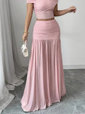 Women's pleated long skirt in polyester fibre, pink colour, with medium stretch and irregular hem, side view