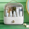 Desktop cosmetics storage box in PET hip material, dustproof, in green colour with lipsticks and blushes inside.