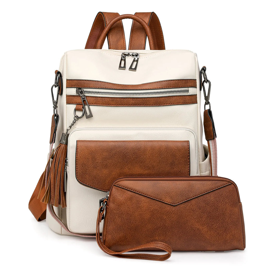 Retro women's backpack with two-tone fringe, soft PU outer, multiple compartments, available in various colours.