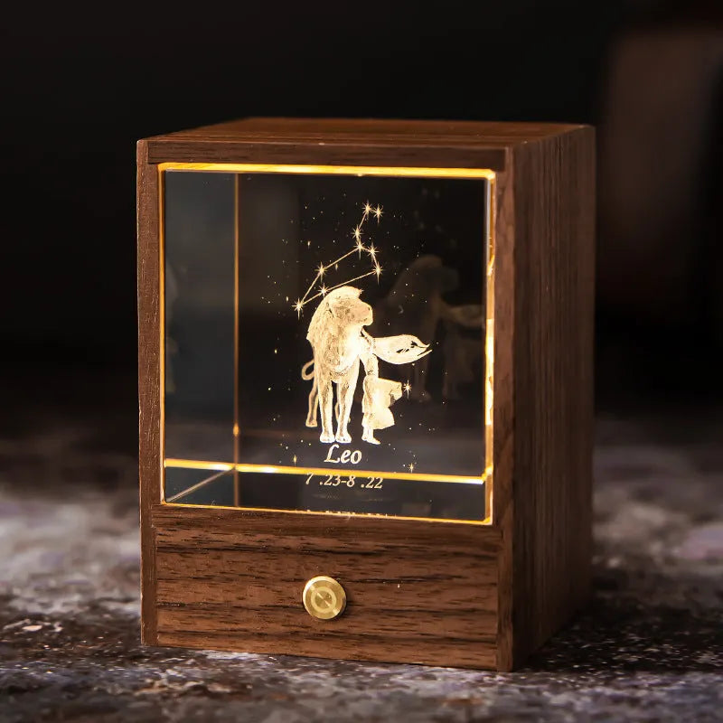 Crystal LED table lamp with black walnut base and K9 crystal showing constellation night light effect