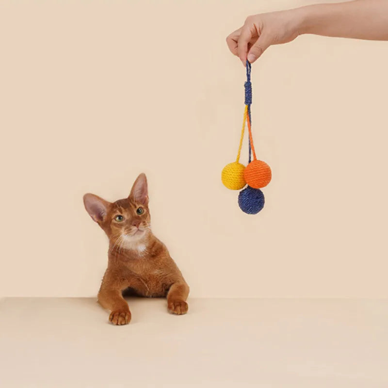 Blue, green, and multi-colour cat toy set with a teaser stick, catnip balls, and a wand.