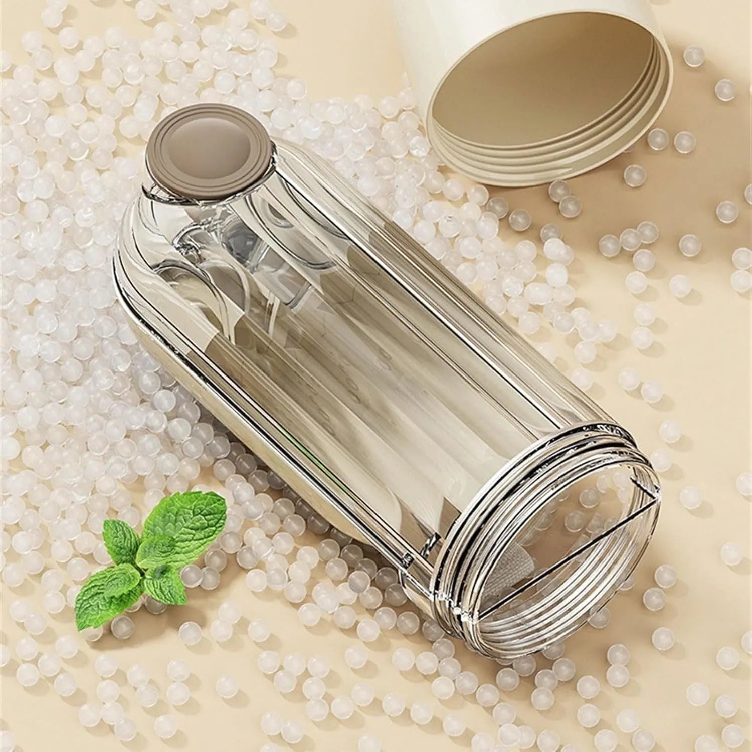 Beige and green foldable dog water bottle with food container, showing dimensions.