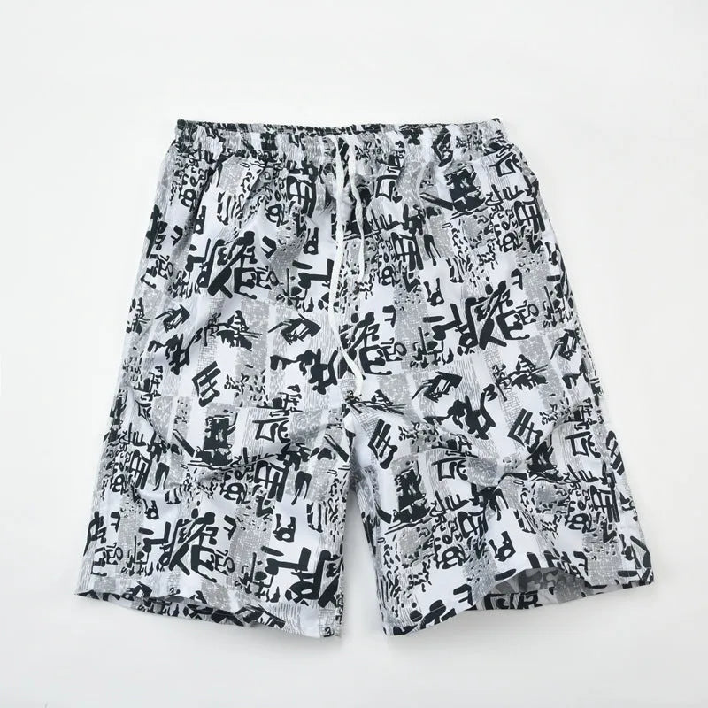 Men's floral print five-point swimming trunks in polyester fabric for pool and beach use