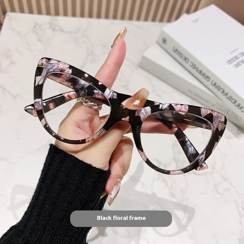 Women's large cat's eye frame presbyopic glasses with dragon and phoenix pattern decoration on the temple.