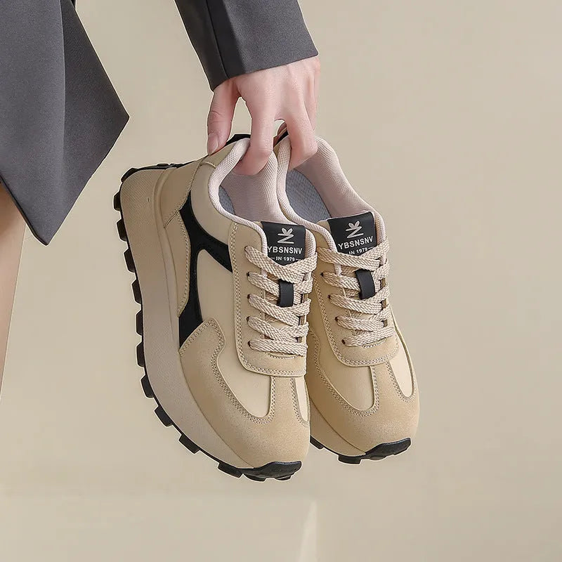 Women's solid colour low-top platform trainers with lace-up front and flat rubber sole