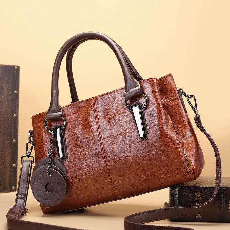PU leather shoulder bag in vintage brown colour with internal organiser compartments and single strap