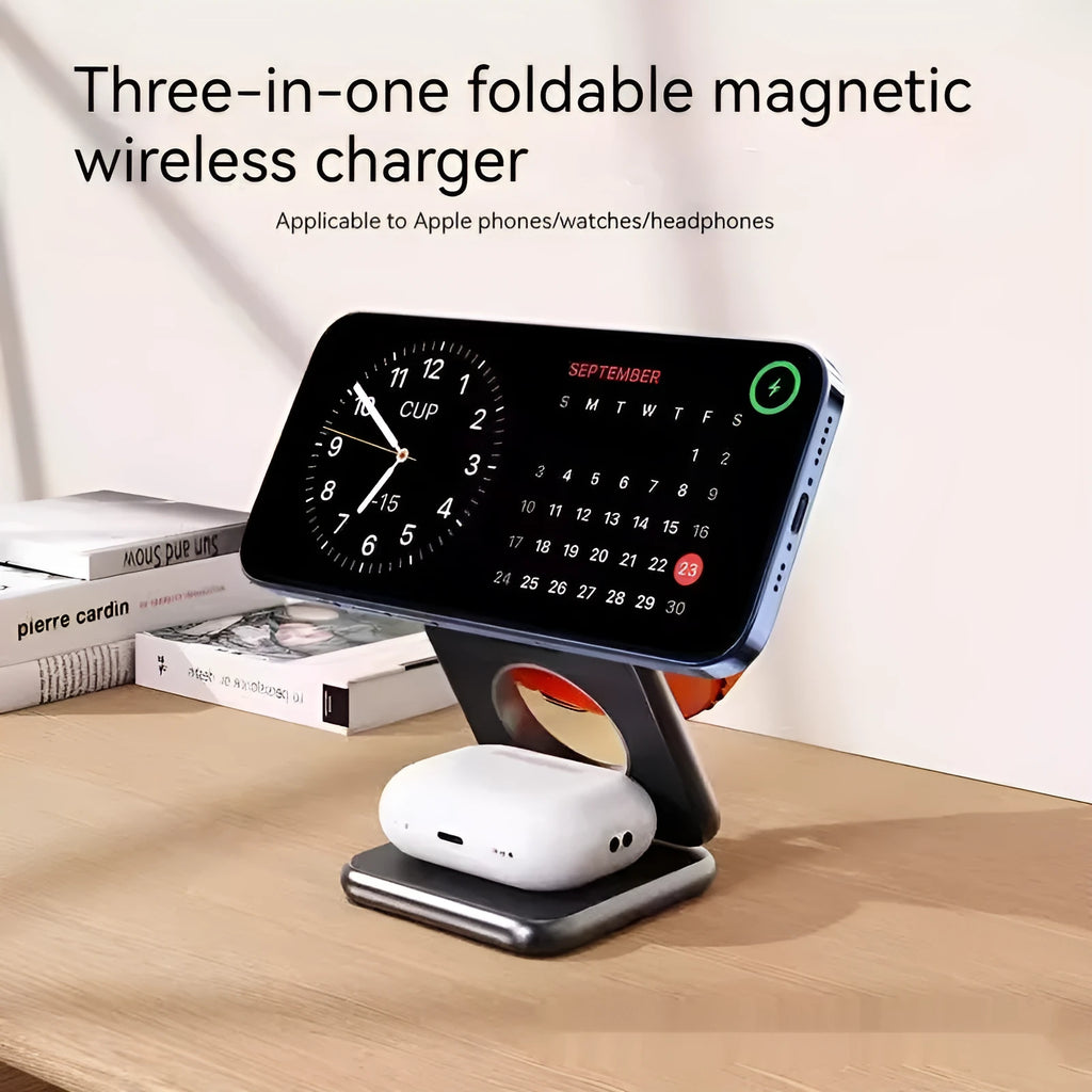 White foldable magnetic wireless phone charger holder in open position on a desk