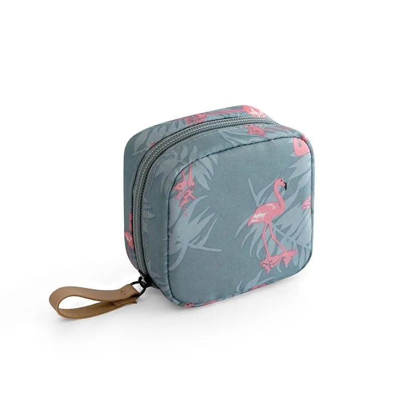 Blue cloth cube-shaped makeup storage bag with a plain pattern.