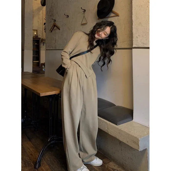 Women's khaki loose-fit casual sports suit with long sleeves and full-length trousers.